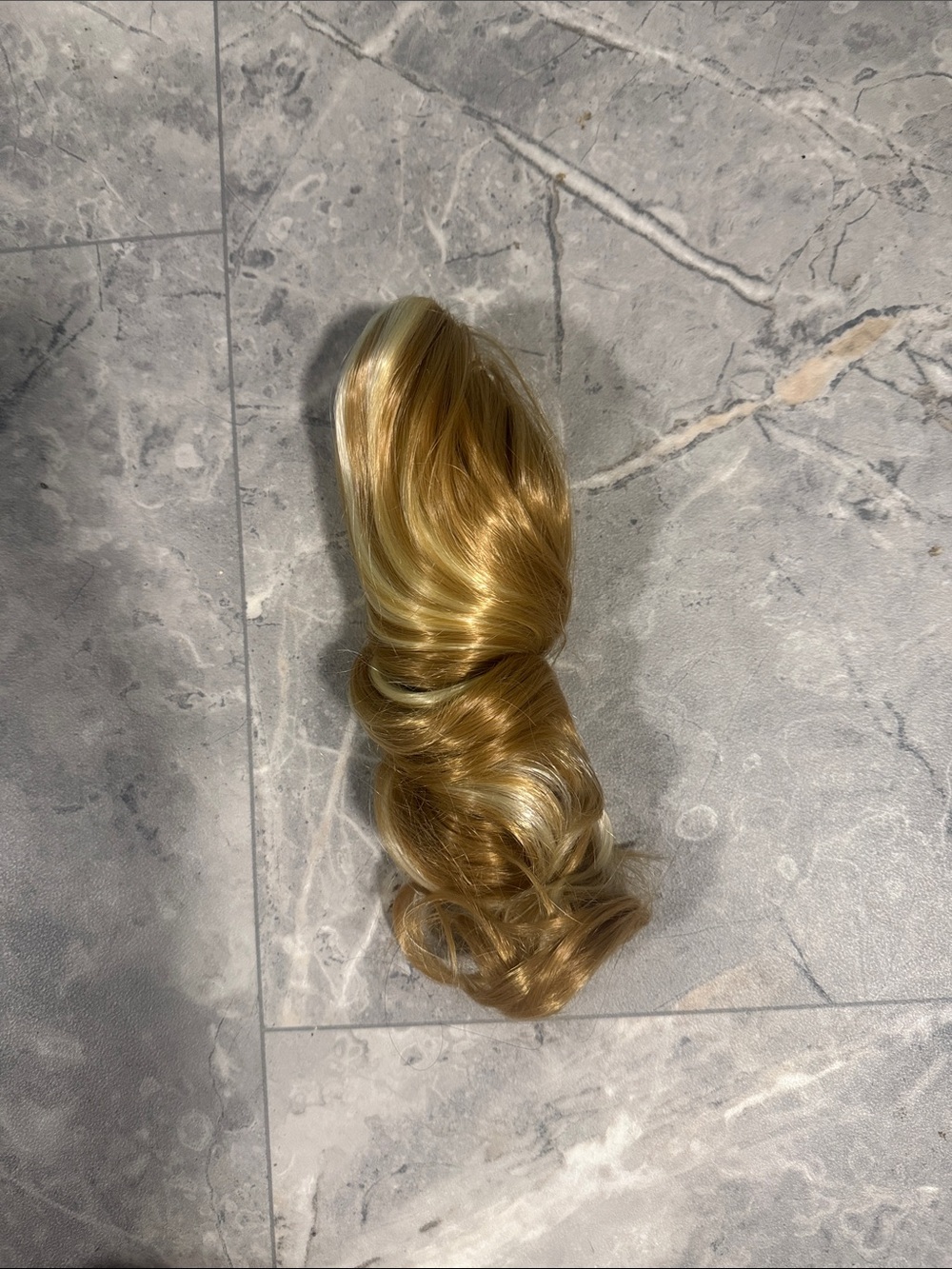 2/$30. 14” Synthetic Blonde Clip-In Ponytail Extension - Natural Golden Blonde